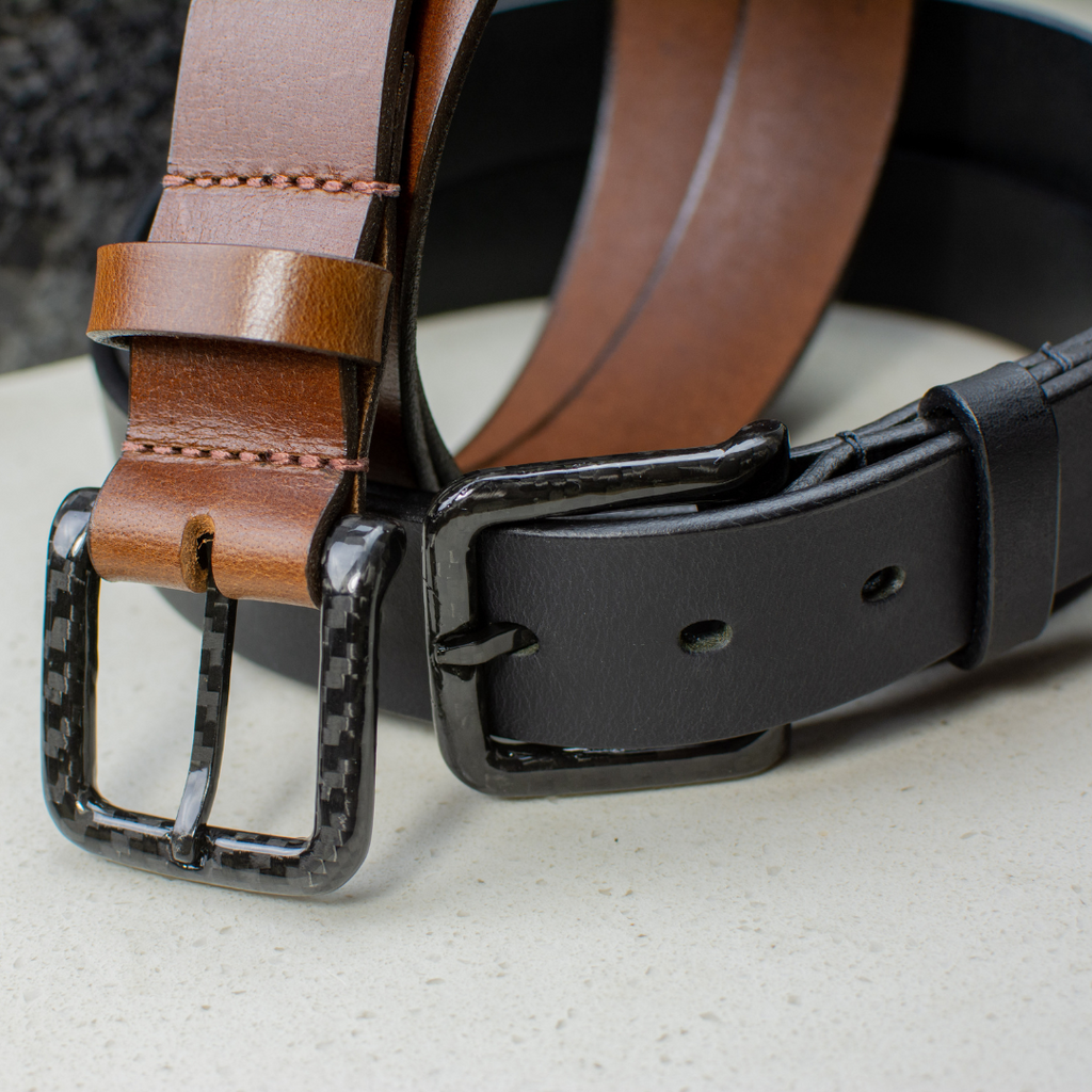 The Specialist Belt Set has rounded black carbon fiber buckles that don't set off metal detectors
